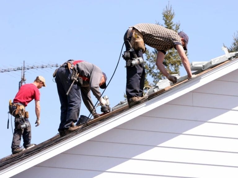 5 Star Roofing professional team coordinating on residential roofing project in Cleveland